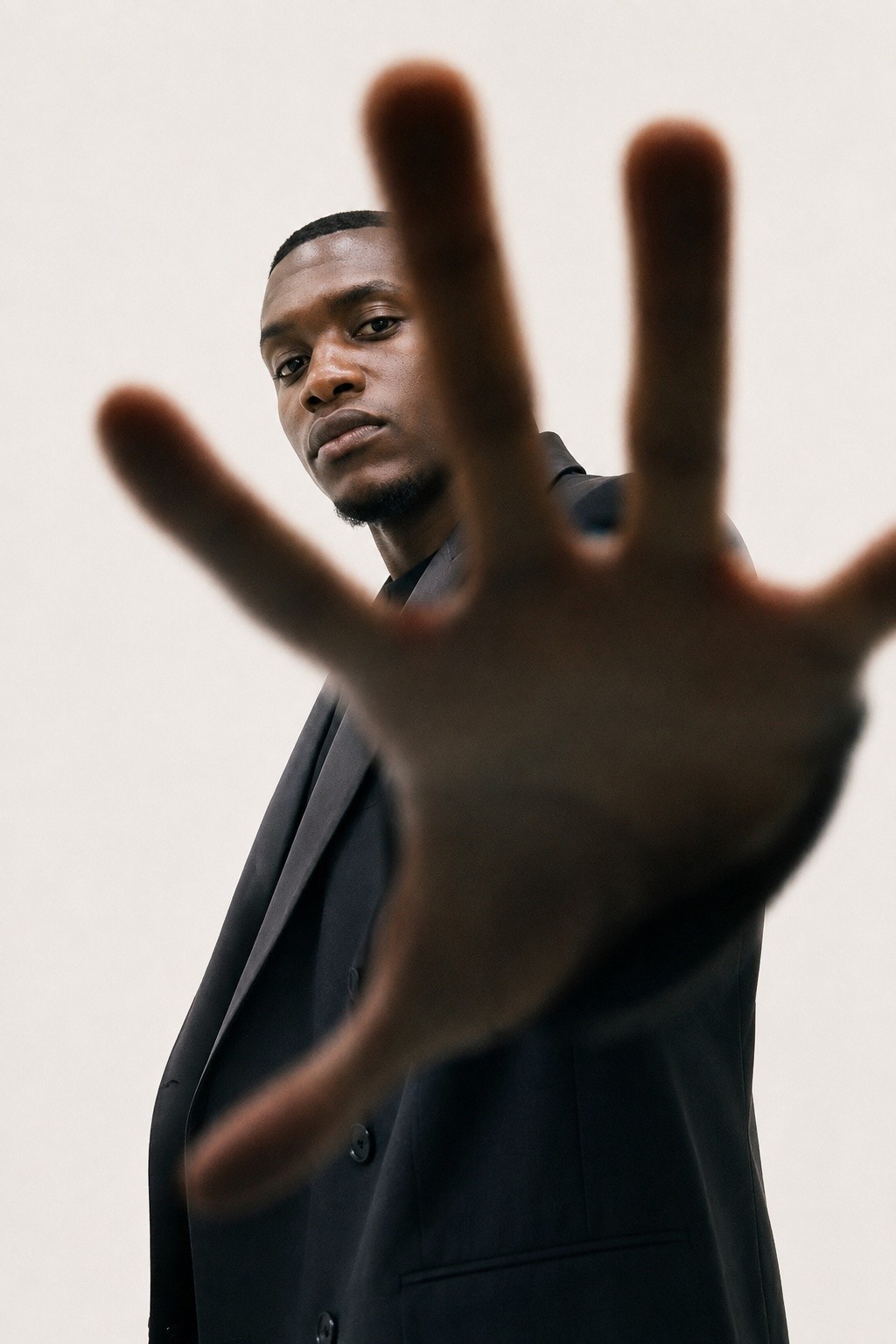 Mbuso Lwazi Dlamini, male menswear and editorial and campaign talent from Johannesburg · Paris, photographed cover portrait.