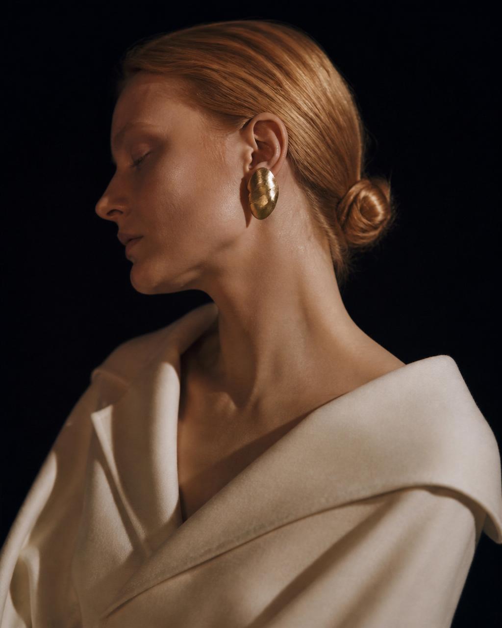 Solène Marchetti, female beauty and jewellery talent from Milano, studio rendered cover portrait.